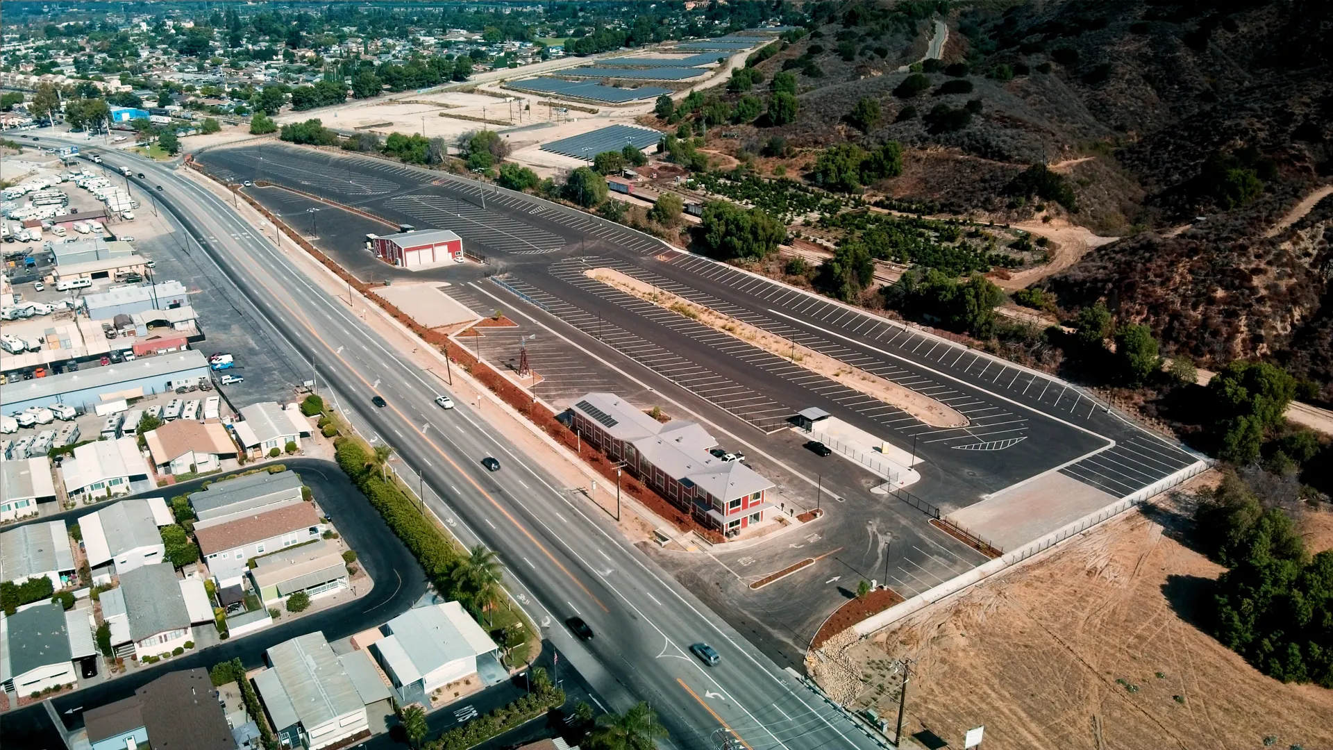 High aerial view of a commercial property and its new perimeter fence